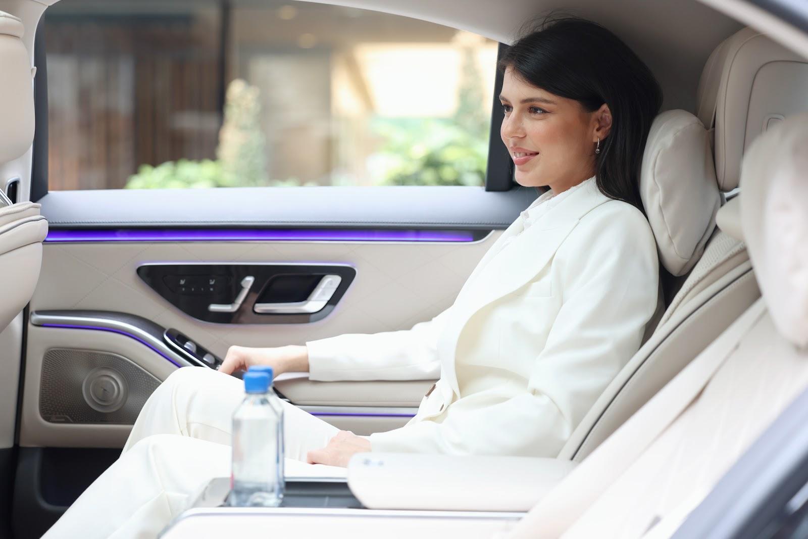 Passenger in the rear cabin of a Limotak vehicle